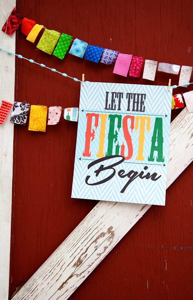 Add a little flair to your Cinco de Mayo Fiesta with this colorful "Let the Fiesta Begin" free printable sign from WhipperBerry