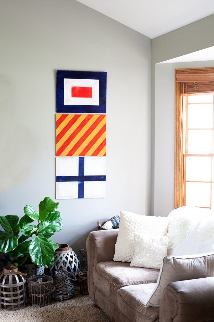 Looking for a fun way to dress-up your boys room? Vintage Nautical is one of my favorite ways to decorate for my little guy. Come learn how I created these painted nautical signal flags for Gage's room... WhipperBerry