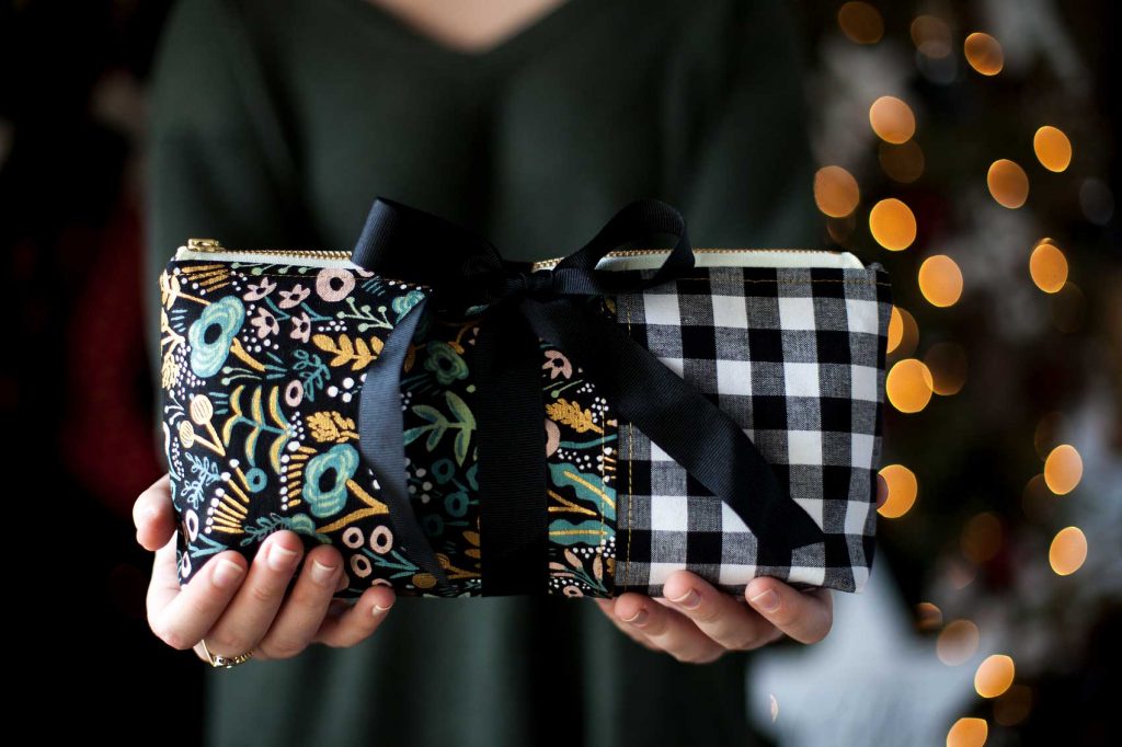 Everyone loves thoughtful homemade gifts and this stylish zipper pouch is the perfect gift to whip-up in a fews hours to give as a fabulous Christmas gift this year + you can take the guess work out of cutting the pattern with the Cricut Maker! Come on over and learn how to make one of your own on WhipperBerry.
