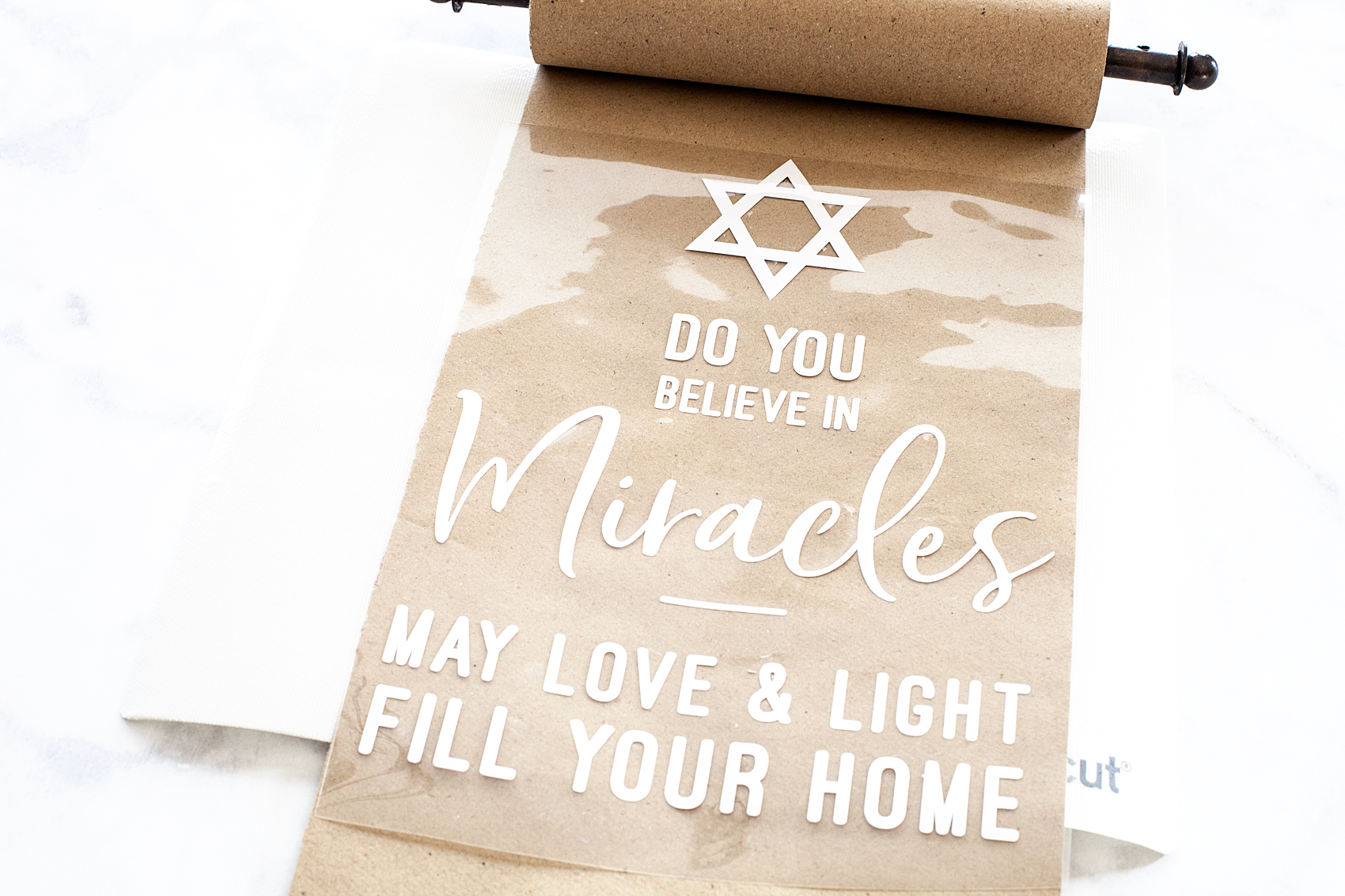 Create this meaningful sign for Hanukkah this year using a vintage style paper roll and your Cricut Maker or Explore Air machine and the @cricut Easy Press • Video Tutorial created by WhipperBerry
