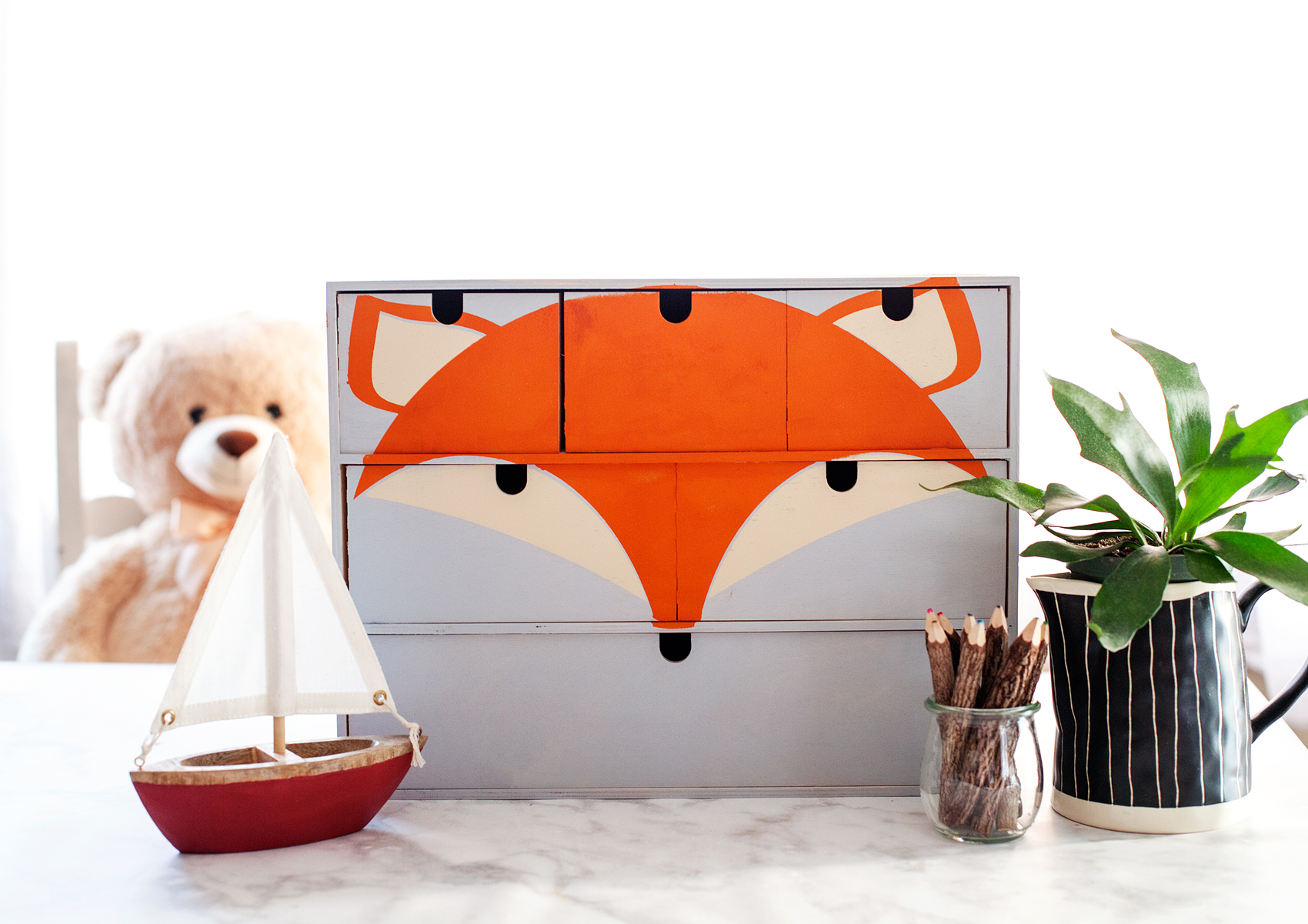 Transform a simple mini storage chest from IKEA into this cute little fox storage chest for your little ones little toys and trinkets. I used some of the @decoart chalky finish paint along with my @cricut Maker to create this fun design for my little boys room • WhipperBerry