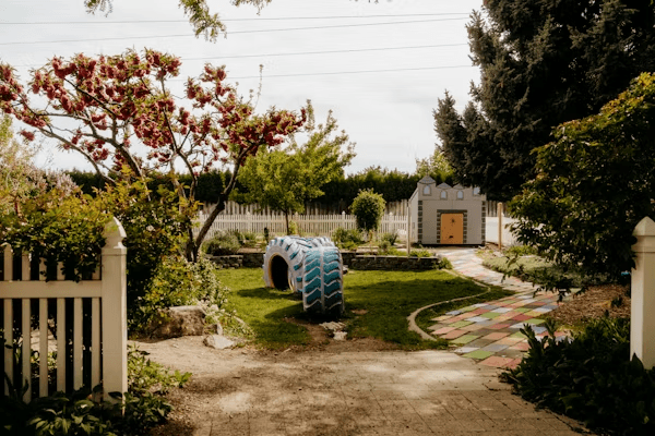 Blue tire in a garden, highlighting potential
