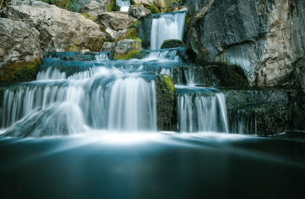 Small waterfall in an Icelandic forest