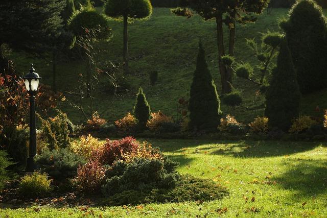 A lamp post standing in a lush European-style