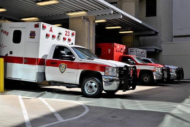 Ambulances parked in a garage, ready for health