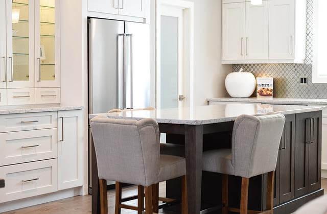 Custom kitchen with center island and chairs