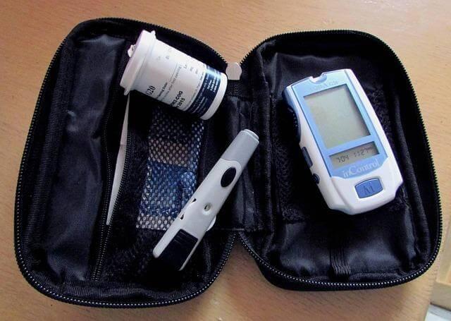 Electronic medical device in a case on a table