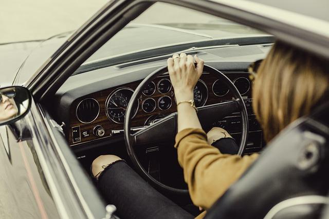 teen driving a car
