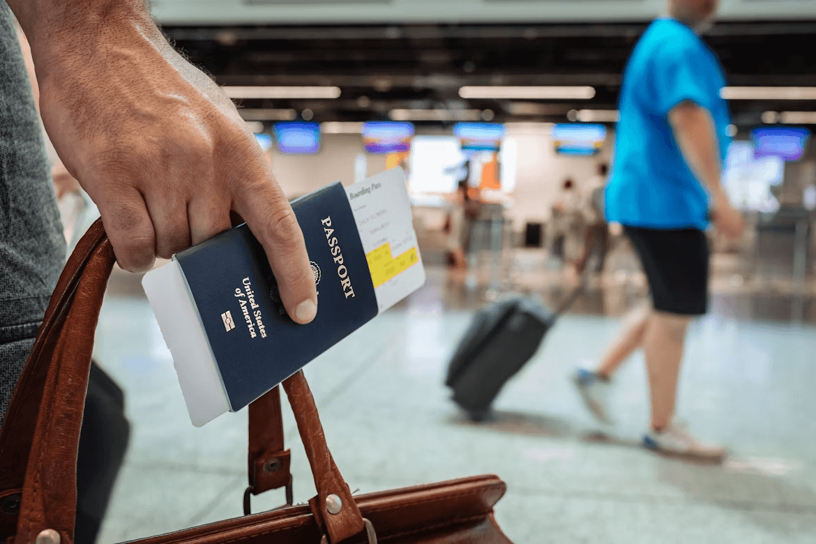 Traveler holding a passport