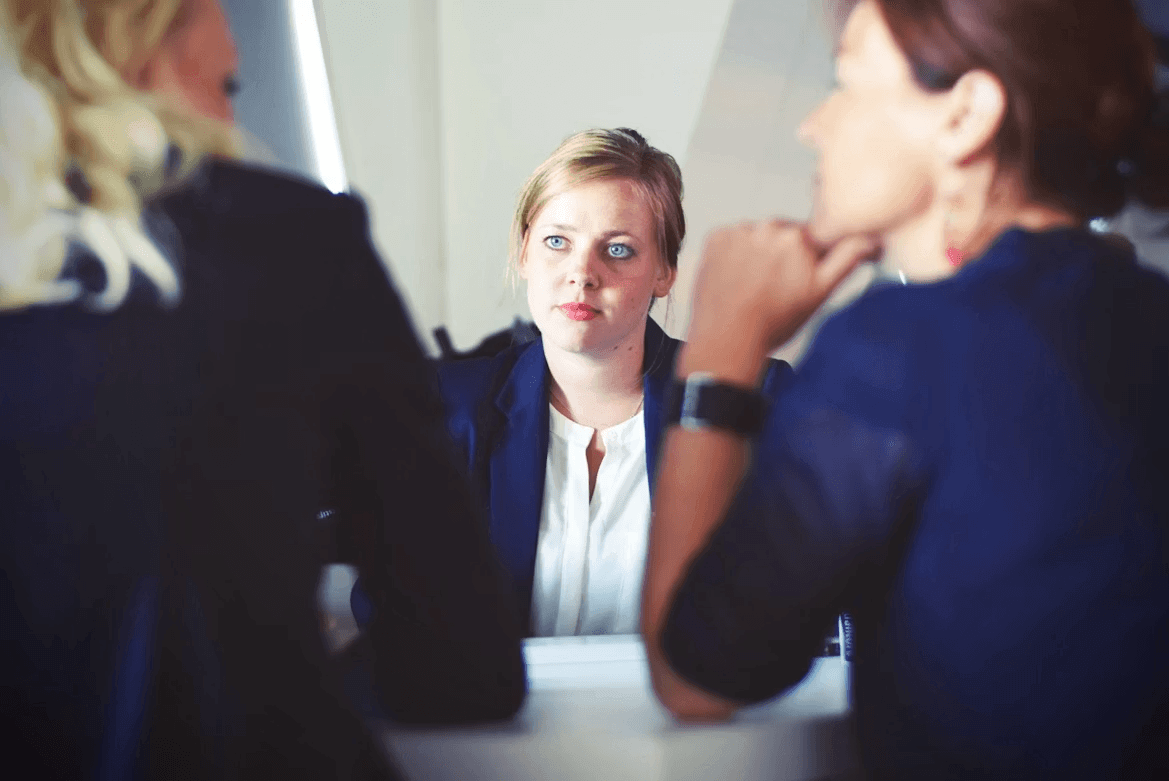 Two women discussing a family landlord-tenant