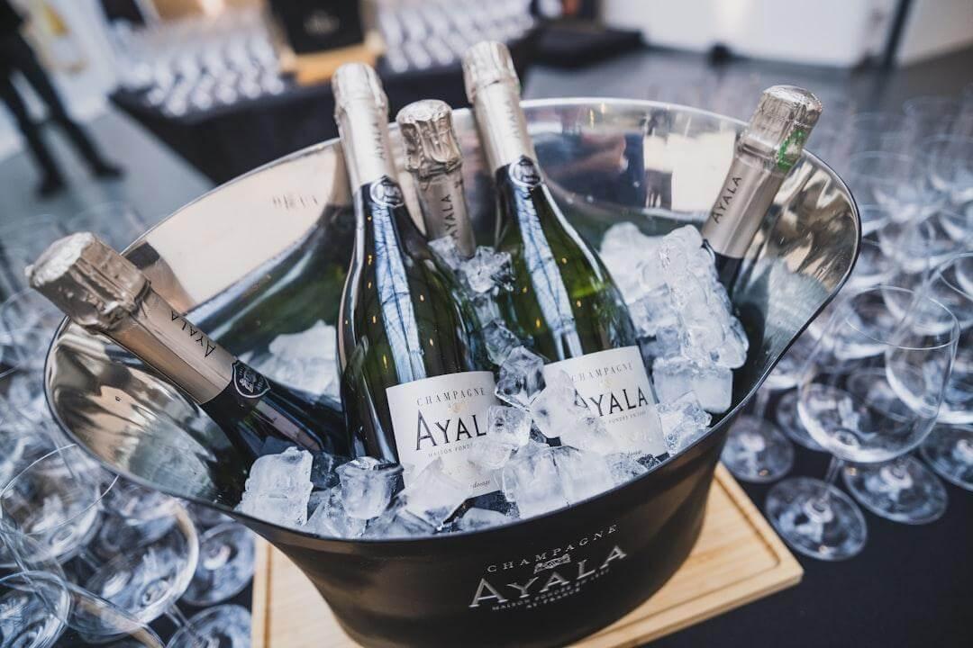 Champagne bottles in ice bucket for a home