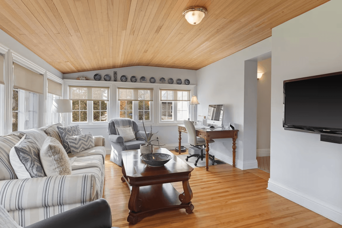 Living room with furniture and flat screen TV, ready