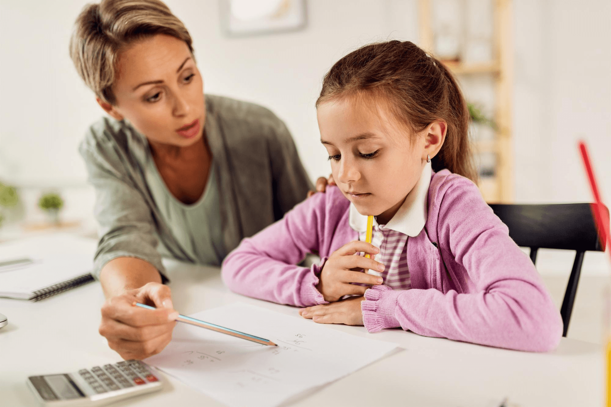 Woman and child calculating Florida child support