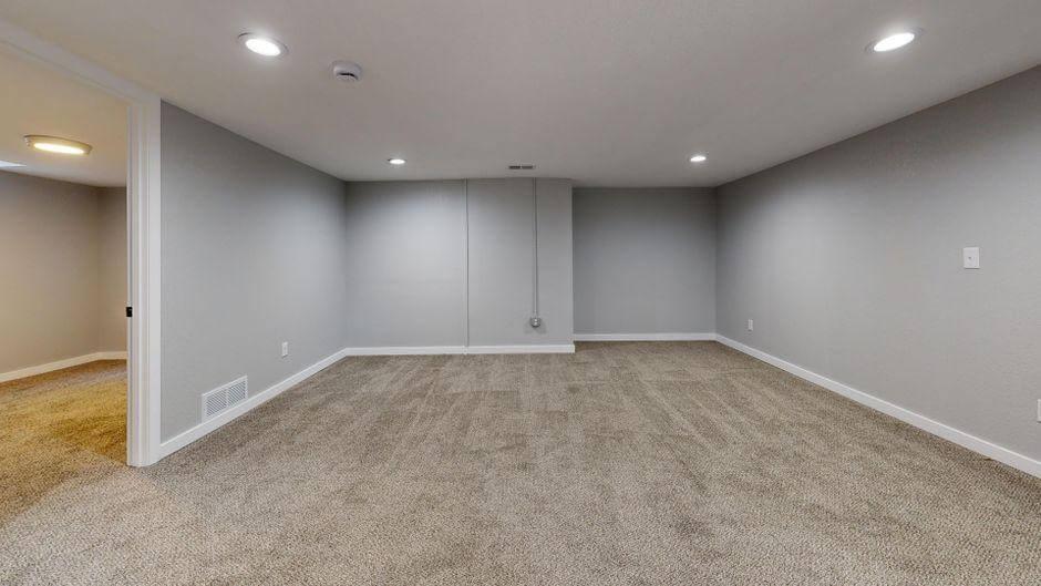 Empty basement room ready for finishing into