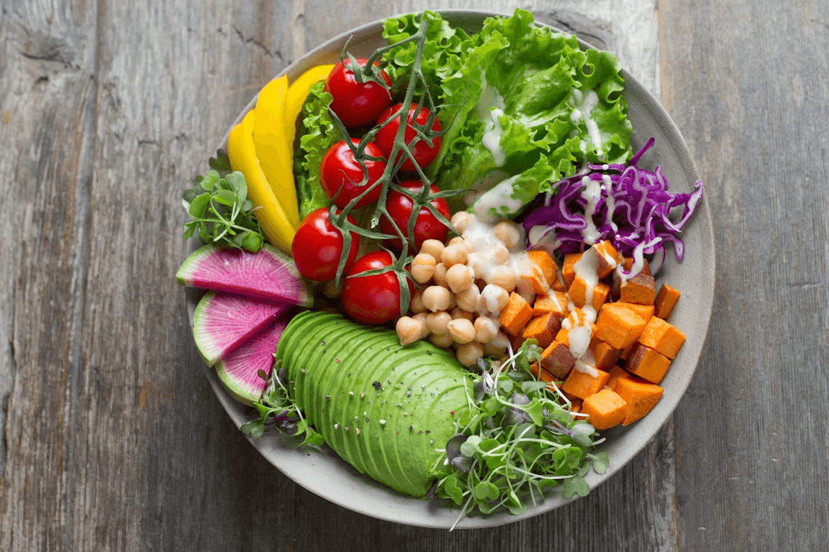 A salad on a white plate,