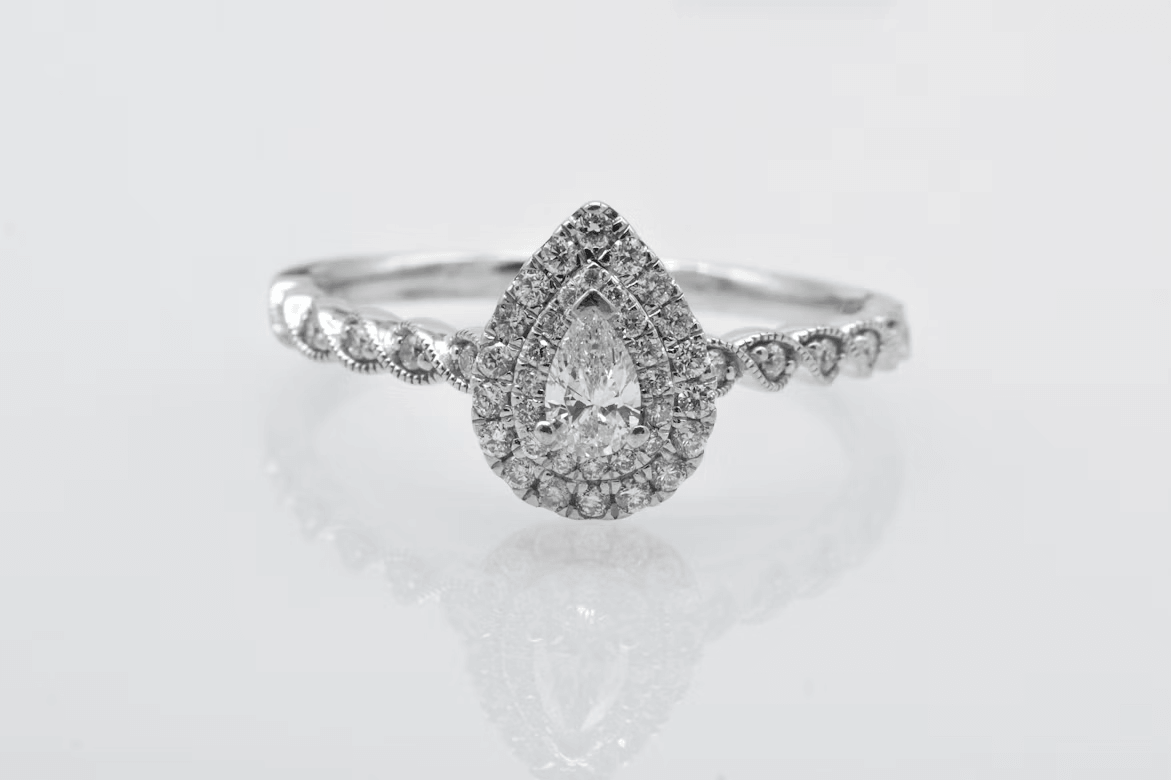White gold engagement ring with a pear-